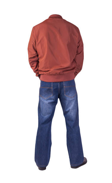 istock dark blue jeans, black leather shoes, jacket isolated on white background. 1309930041