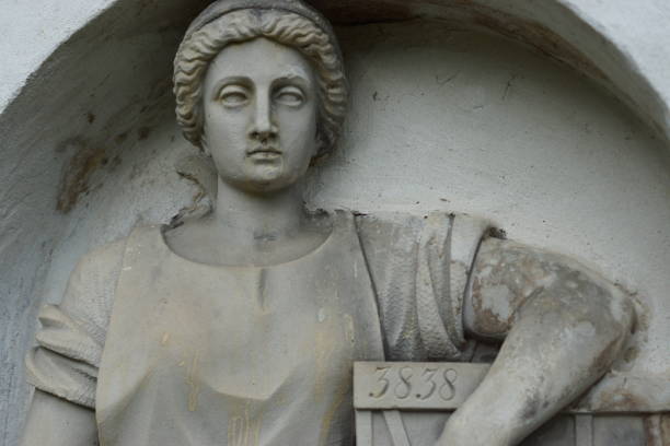 istock Woman at the grave 1309930735