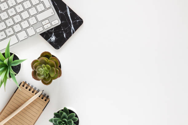 istock A desk in a home office. View from above. White empty copy space. 1309931154