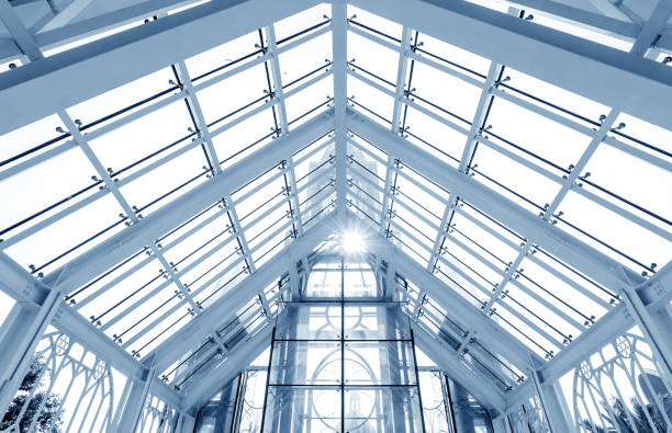 istock Transparent glass house in the park 1309931964