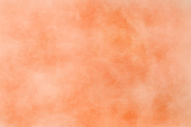 istock Rough matt concrete surface Variety spots swirls pattern Ink mix ombre Trendy drawn image Colorful orange pink coral salmon shades 1309932566