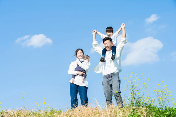 istock parents and children taking a walk 1309934868