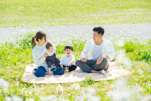 istock Parents and children enjoying a picnic 1309936206