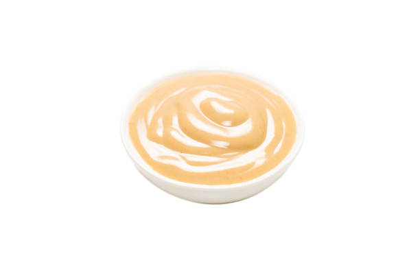 istock Mushroom sauce in a bowl isolated on white background. 1309936406