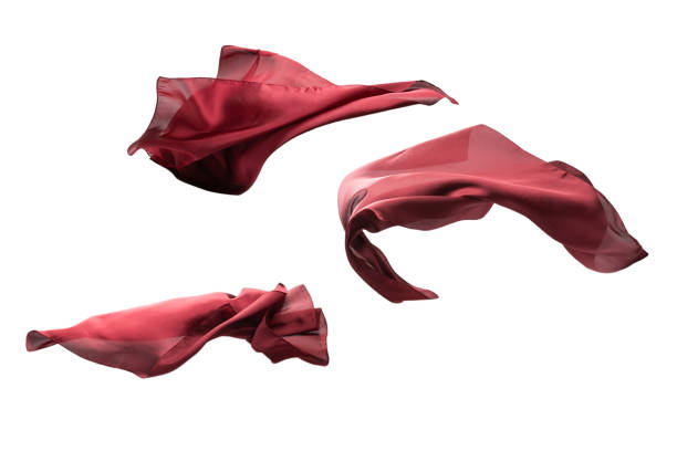 istock Flowing red silk scarf isolated on white background. 1309936441