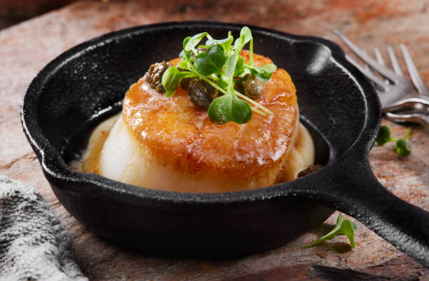 istock Jumbo Pan Seared Diver Scallops with Roasted Cauliflower Puree 1309937160