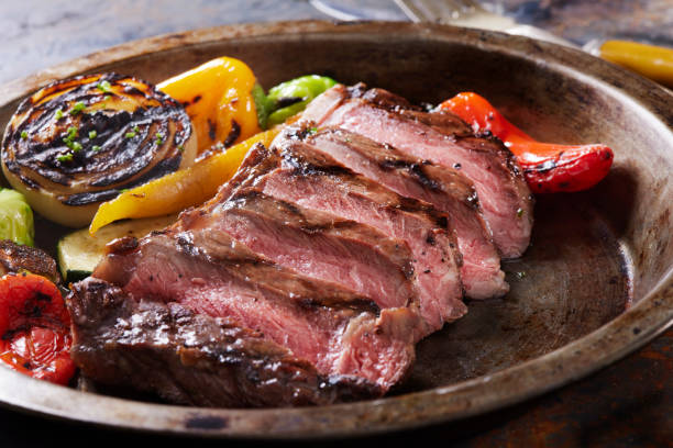 istock BBQ Venison (Elk) New York Strip Steak with Roasted Vegetables 1309937839