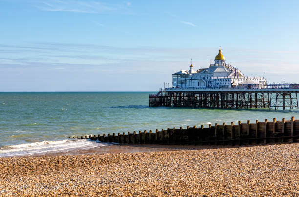 Eastbourne Coastline, East Sussex, UK Eastbourne Pier on a foggy day, Eastbourne, East Sussex, England, UK eastbourne pier photos stock pictures, royalty-free photos & images