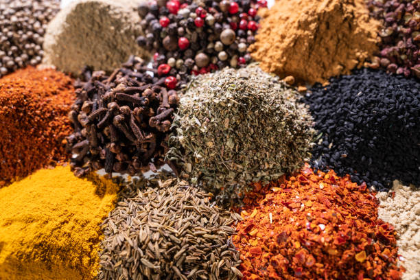 istock mix of spices on a white background. Top view. Flat lay. Set or collection 1309939229