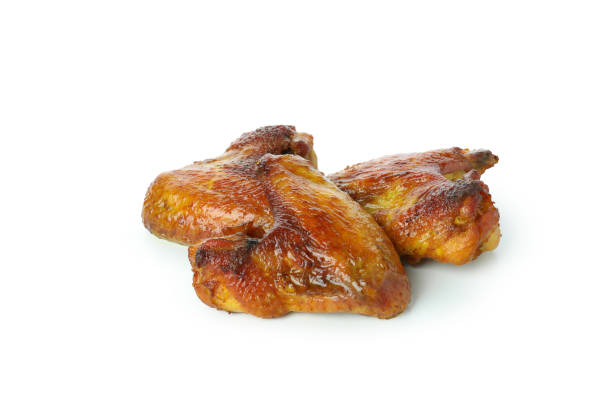 istock Baked chicken wings isolated on white background 1309939481