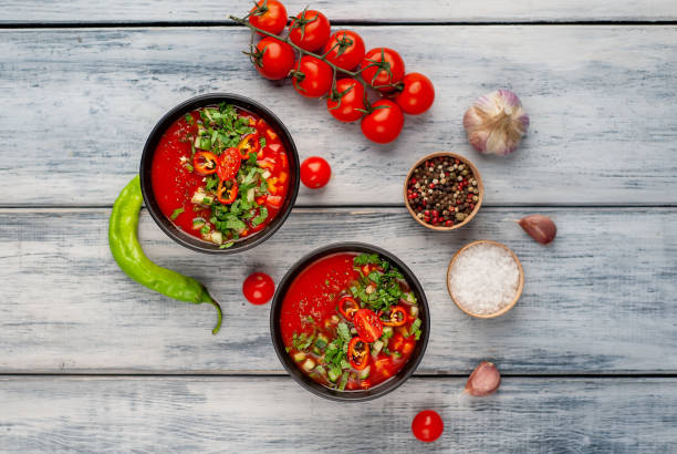istock Traditional Spanish cold tomato soup gazpacho on wooden background 1309946312