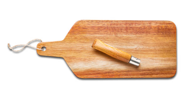 istock Wooden cutting board and pocket knife isolated on white 1309946362