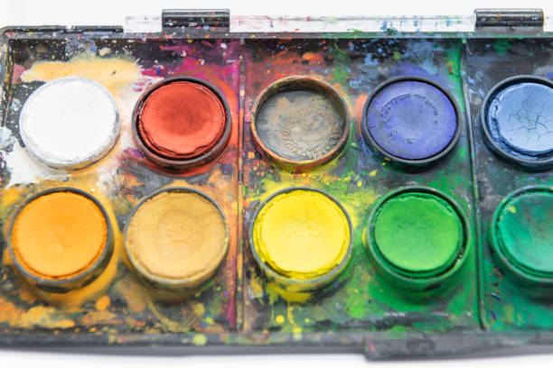 istock Close-up colored watercolor paints 1309948223