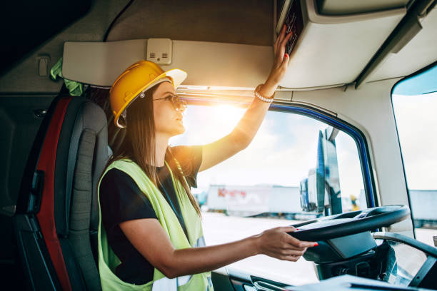 istock Professional happy female truck driver working 1309951301