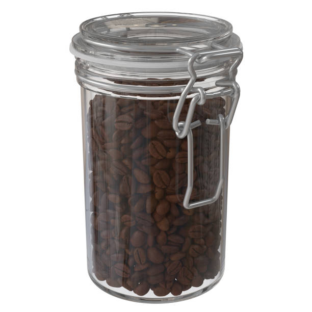 istock Glass jar with coffee beans isolated 1309952376
