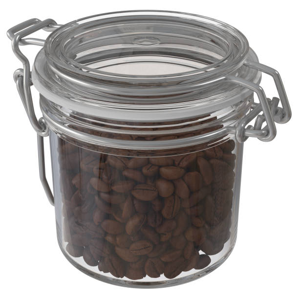 istock Freshly roasted coffee beans in a glass jar. 1309953377
