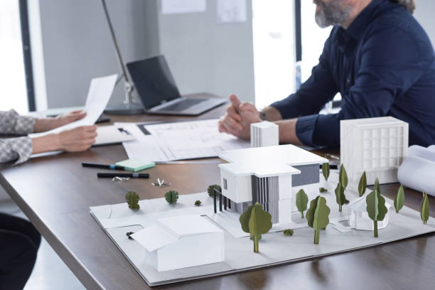 istock Little model of new modern building 1309955110