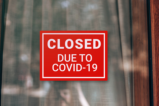 Closed sign due to Covid-19. Stores, restaurants, offices, other public places temporarily closed