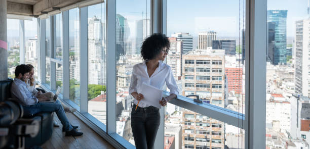 istock Mixed business team, Buenos Aires in background 1309957757