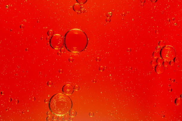 istock Red macro drink bubbles'Cola with Ice. Food background ,Cola close-up ,design element. Beer bubbles macro,Ice, Bubble, Backgrounds, Ice Cube, Abstract Backgrounds 1309960741