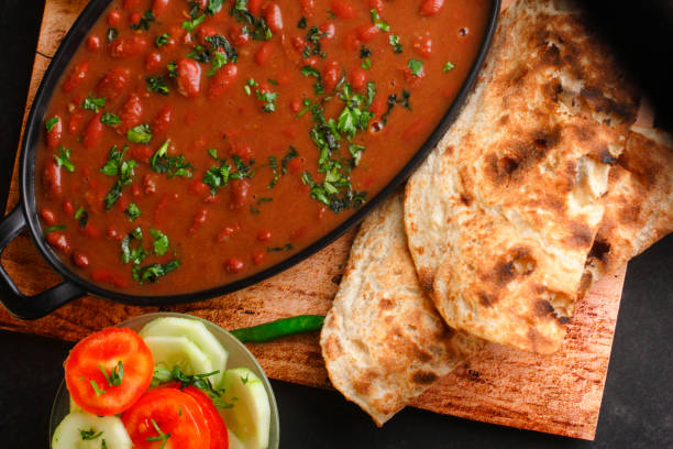 Rajma Chawal - an indian food Rajma chawal- typical north Indian main course, kidney bean curry and boiled rice with roti rice bowl restaurant stock pictures, royalty-free photos & images