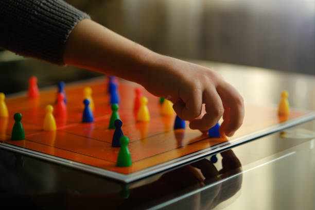 istock Child's Hands close up. Board games concept. 1309964589