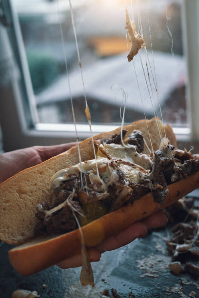 istock Preparing Chili Cheese Steak Sandwich Philly Style 1309967153