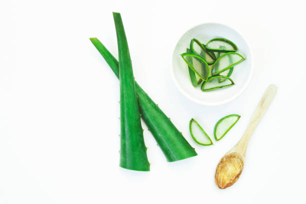 istock Fresh sliced Aloe Vera leaf isolated on white background, top view 1309969110