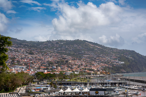 The city of Funchal on the island of Madeira. Funchal is the capital and largest city on Madeira, which belongs to Portugal.