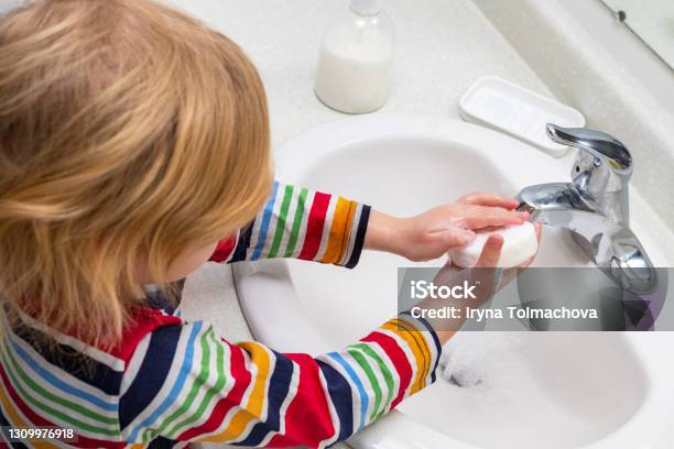 Child Washing Hands With Soap In The Bathroom Stock Photo - Download Image Now - Washing Hands, Child, Boys