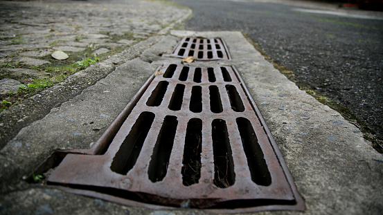 salvador, bahia / brazil - june 27, 2020: manhole grating for rainwater drainage is seen in a condominium in the city of Salvador.