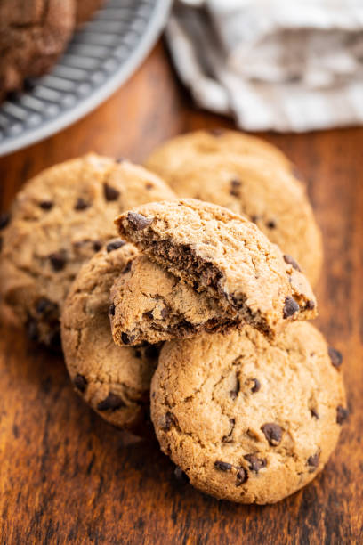 istock Tasty biscuits with chocolate. Sweet chocolate cookies 1309977988