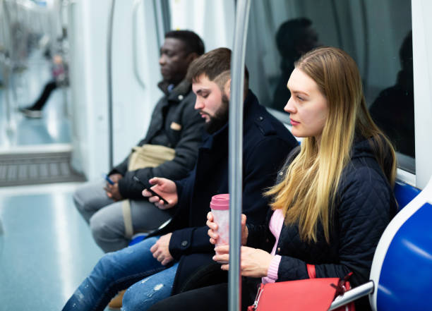 istock People traveling in subway car 1309978333