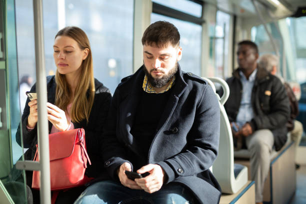 istock People riding city bus 1309978360