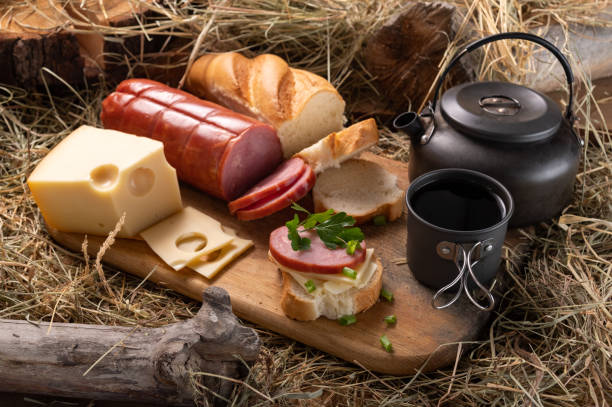 istock Food and drinks. Snack with a sandwich and tea. Rustic stele. 1309984171