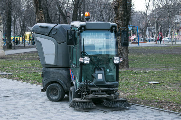 istock Close-up sweeper machine cleaning. Concept clean streets from debris. Selective focus. 1309985443