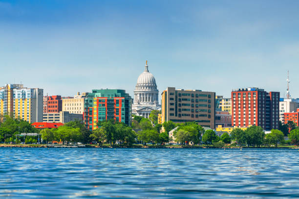 Madison, Wisconsin, USA downtown skyline on Lake Monona. Madison, Wisconsin, USA downtown skyline on Lake Monona in the daytime. madison wisconsin photos stock pictures, royalty-free photos & images
