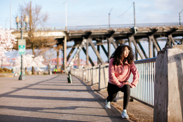 istock Young Woman Stretching Before Her Morning Run 1309991085