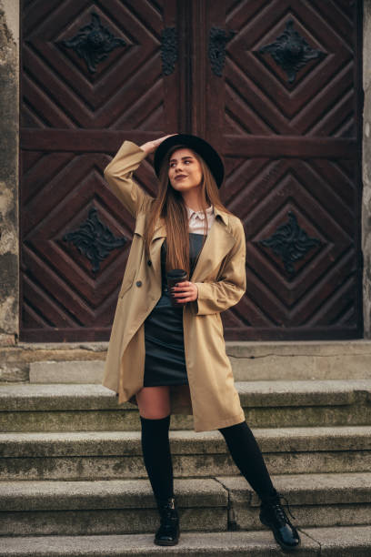istock Woman wearing hat posing outside 1309994437