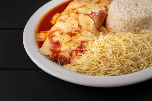 istock Meals - Done Dish - Pancake with tomato sauce and cheese with potato straw and rice 1309996228