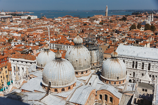 St Mark's Basilica from St Mark's Campanile across Venice skyline in Venice, Veneto, Italy
