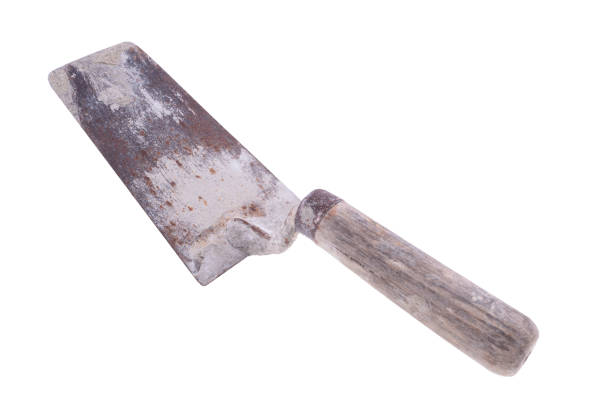 istock Trowel dirty with mortar. Accessories for construction workers. Light background. 1310004342