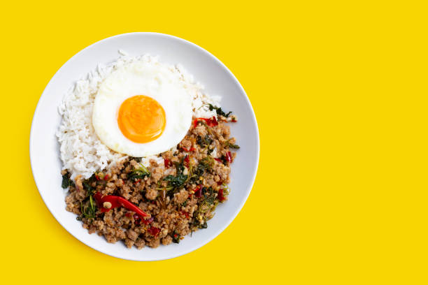 istock Rice topped with stir-fried pork with holy basil and fried egg 1310005944