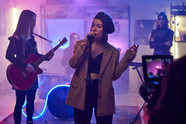 istock Singer performing on the concert 1310014981