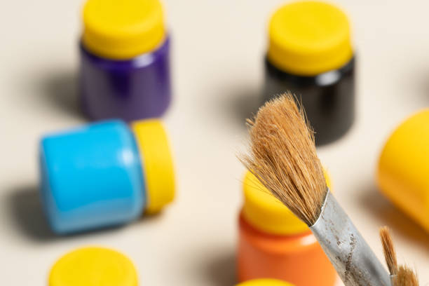istock brush in pot in disposable plastic cup 1310018282