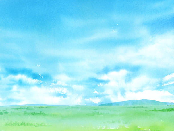 istock Watercolor illustration of sky and green field. 1310024654