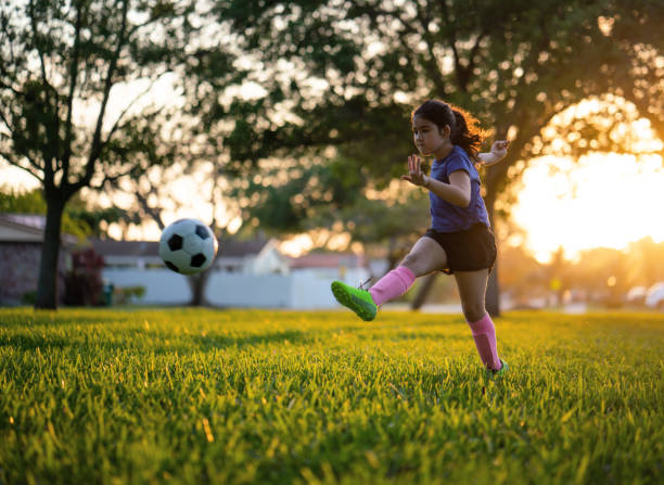 istock Cuban girl practicing soccer skills 1310024667