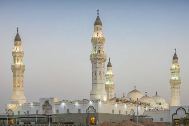 Quba Mosque Medina Saudi Arabia Madinah The historic Quba Mosque in Medina Saudi Arabia at night. It was founded in the 7th century. al madinah stock pictures, royalty-free photos & images