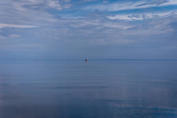 istock view of a lake on a cloudy day 1310027192