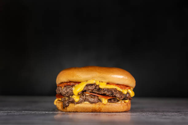 istock smash burger with two burgers, cheese sauce and pepperoni 1310029423